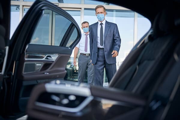 Executive chauffeur service in St. Louis with a luxury black vehicle, representing premium black car transportation